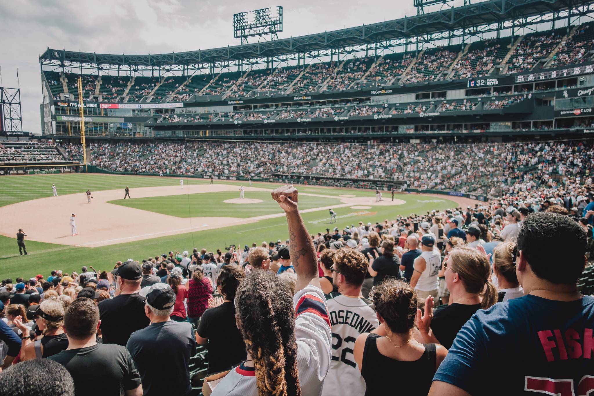 How do Americans align sports fandom with their values?