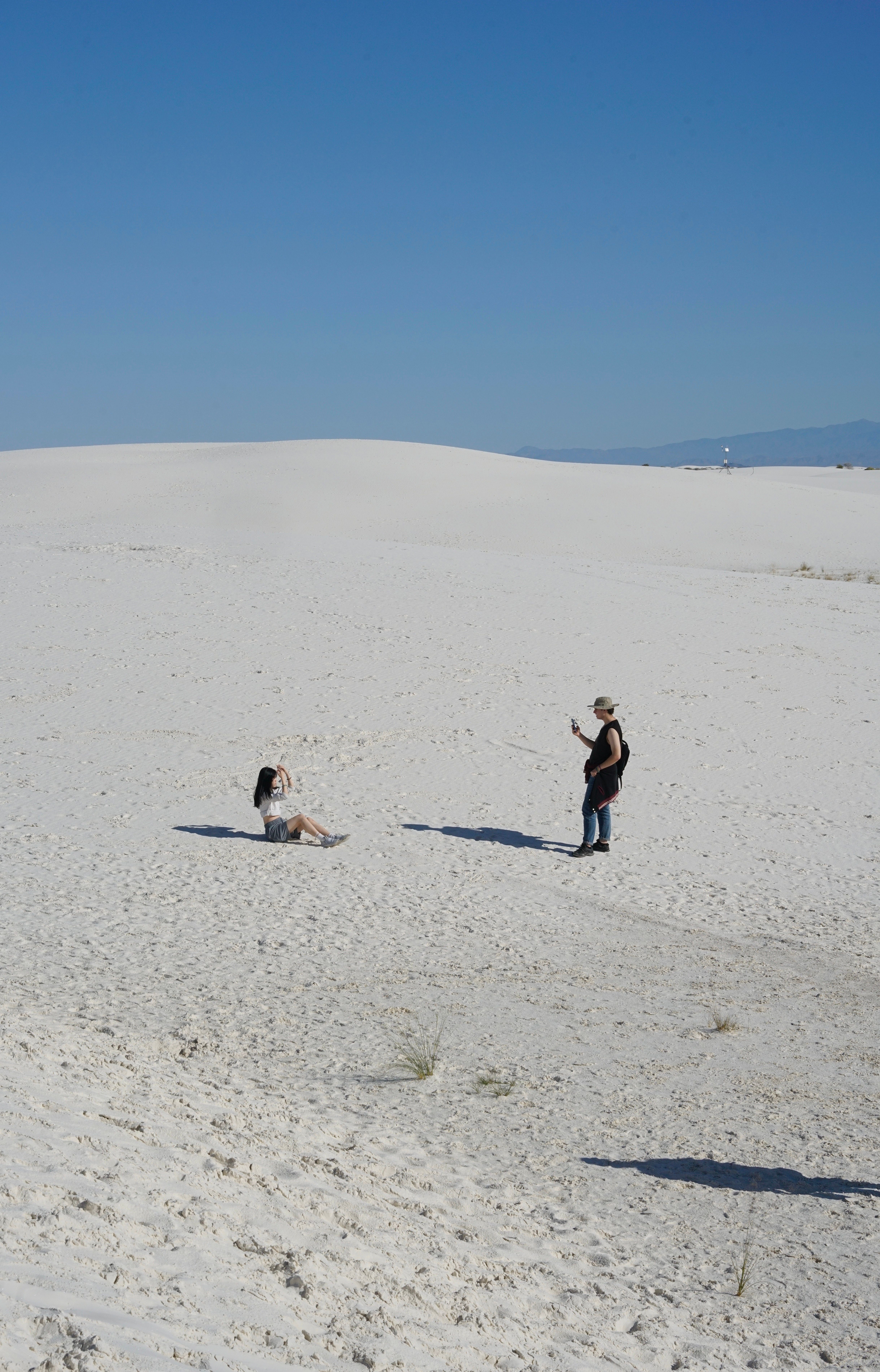 two people taking photos