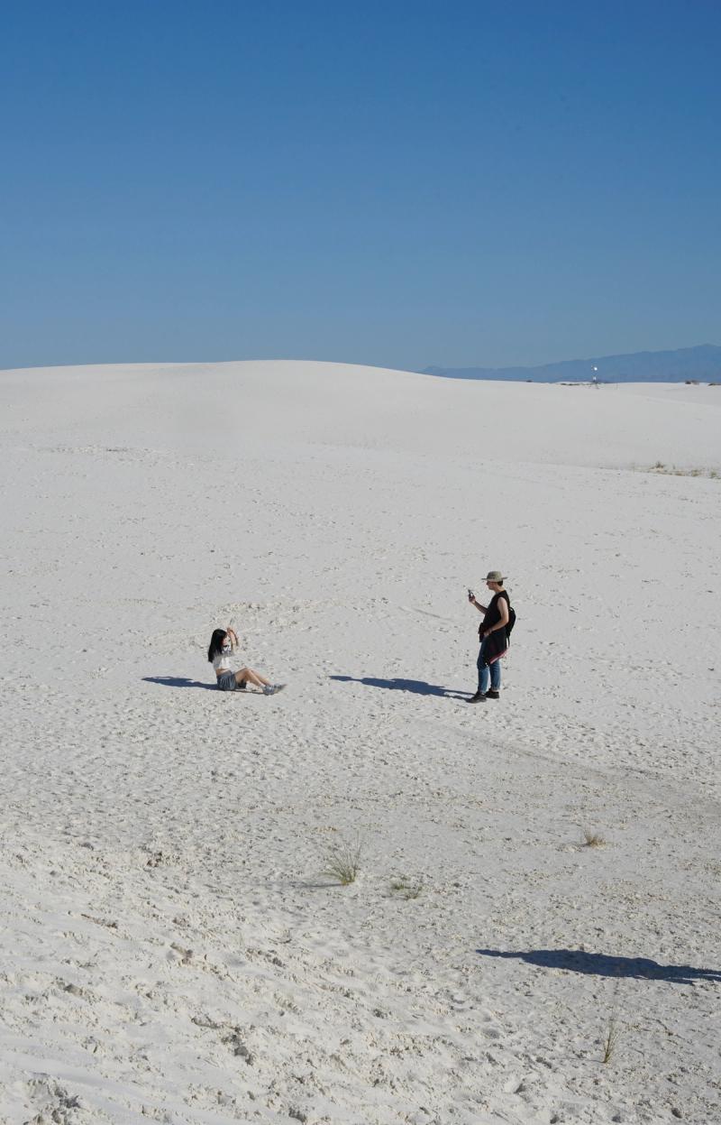 two people taking photos
