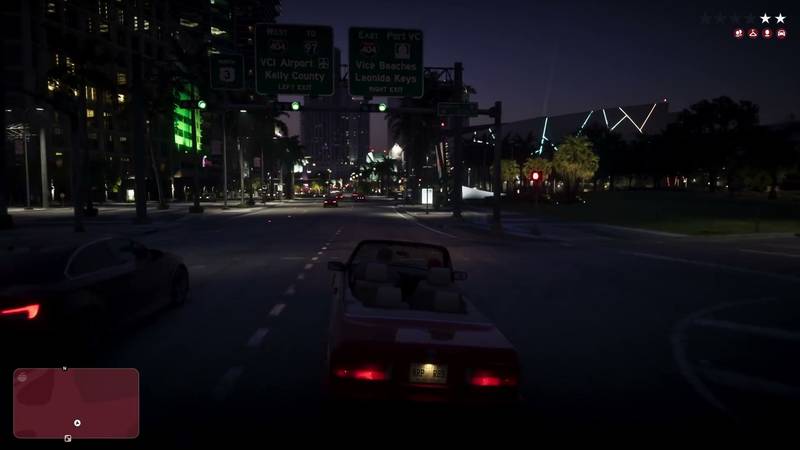 Gameplay of a red convertible driving at night under highway signs for VCI Airport and Vice Beaches, with a wanted level showing.