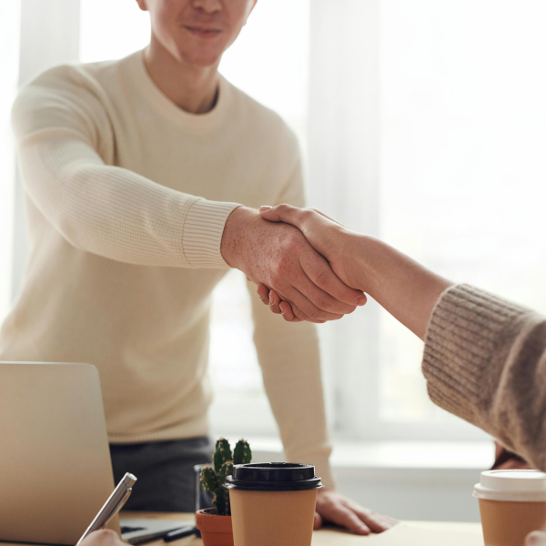 Blog Image People Shaking Hands In Office