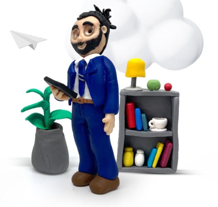 The main clay character: a bearded man with glasses and tied-back hair in a blue suit, holding a phone beside a plant and a small bookshelf, on a “Choose Pickdevs” graphic.