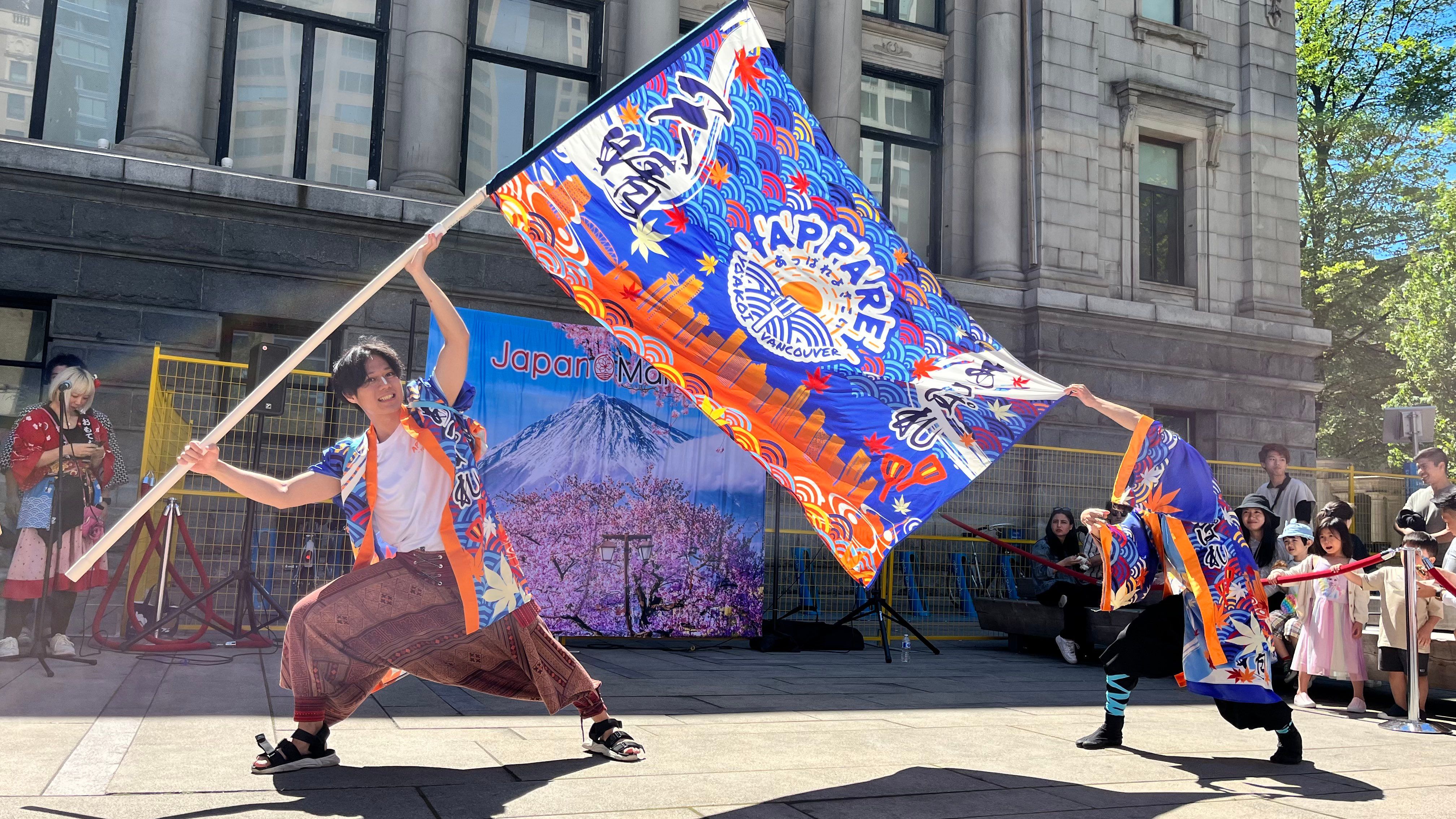 Kaito performing with the flag