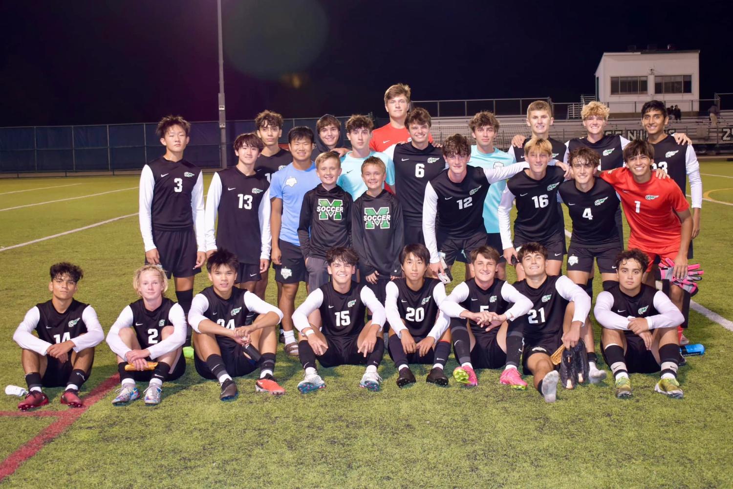 Ben and Griffin Steele with MHS varsity men's soccer team