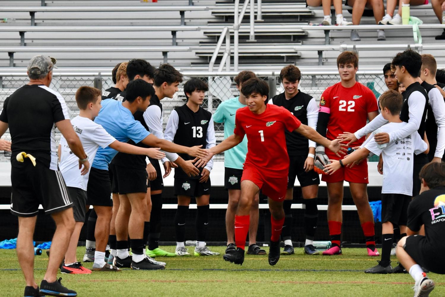 Ben and Griffin Steele with MHS varsity men's soccer team