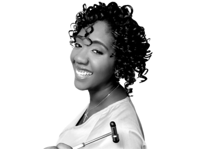 a black and white photo of a woman holding a hammer