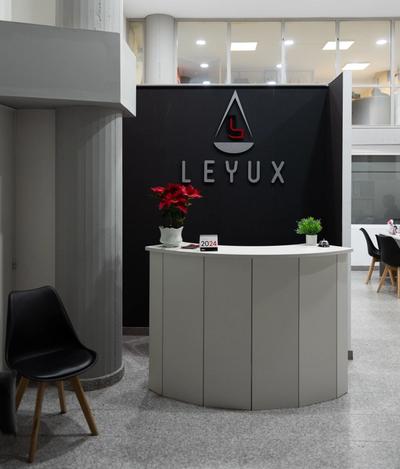 a reception area with a sign that says leyux