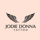 a logo for jodie donna tattoo with wings on a pink background