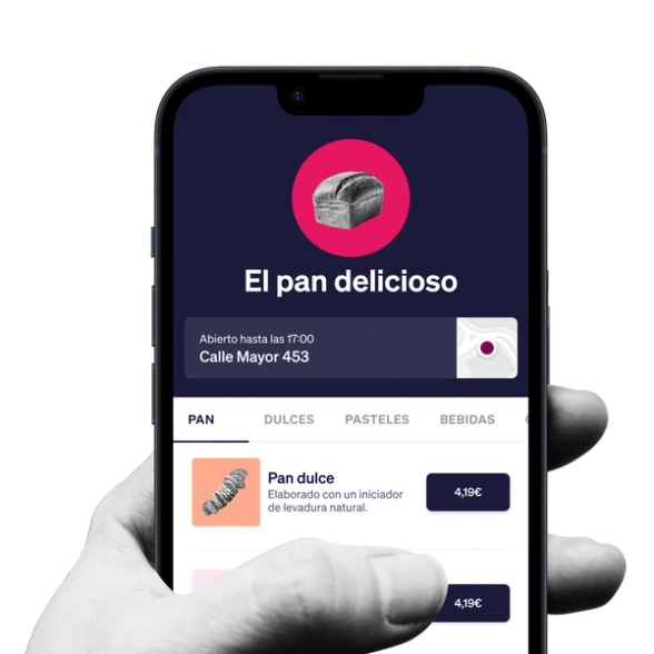 a hand is holding a phone that says el pan delicioso