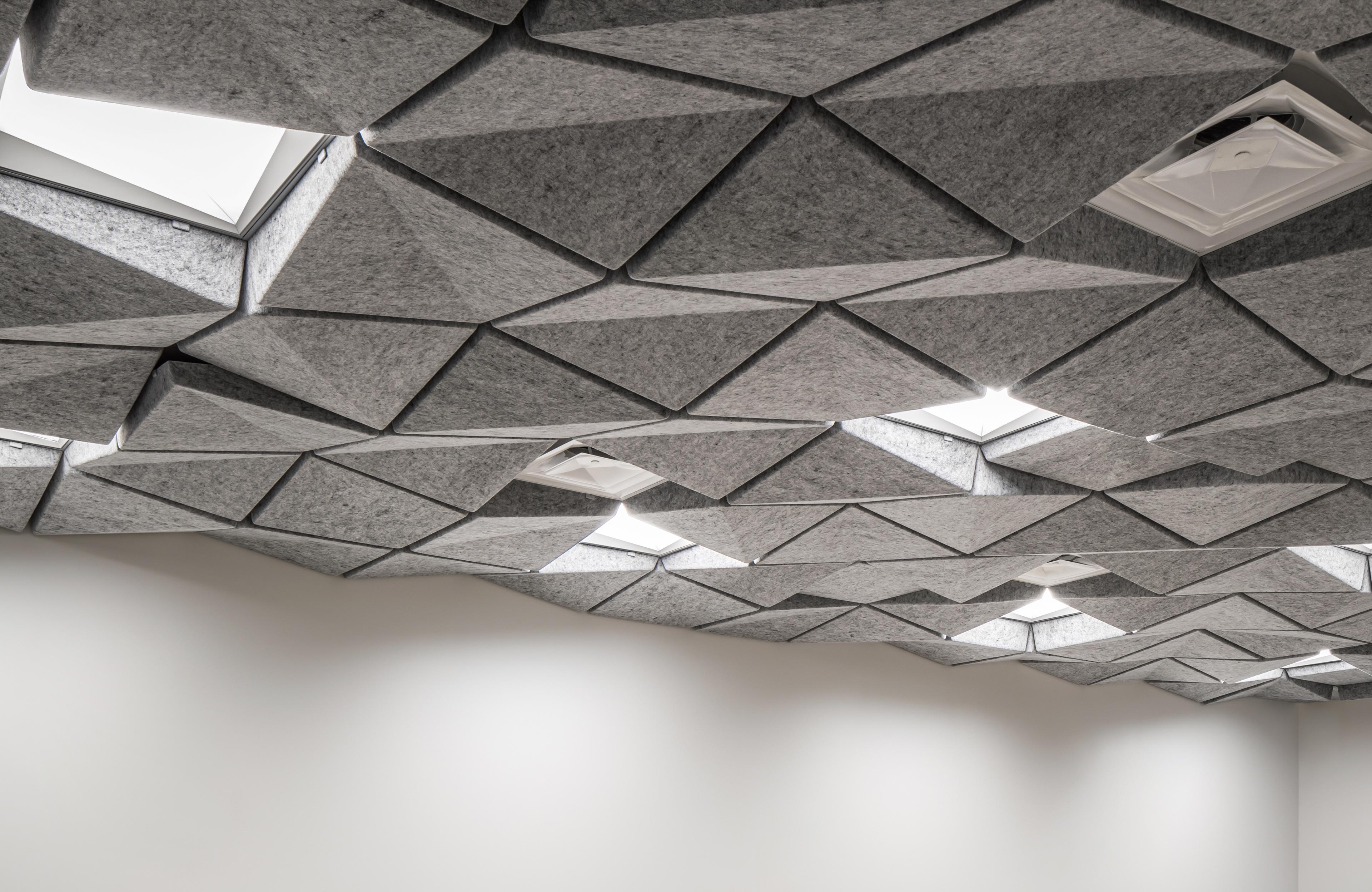 Turf's Crease acoustic ceiling tile at the Opentable Support center.