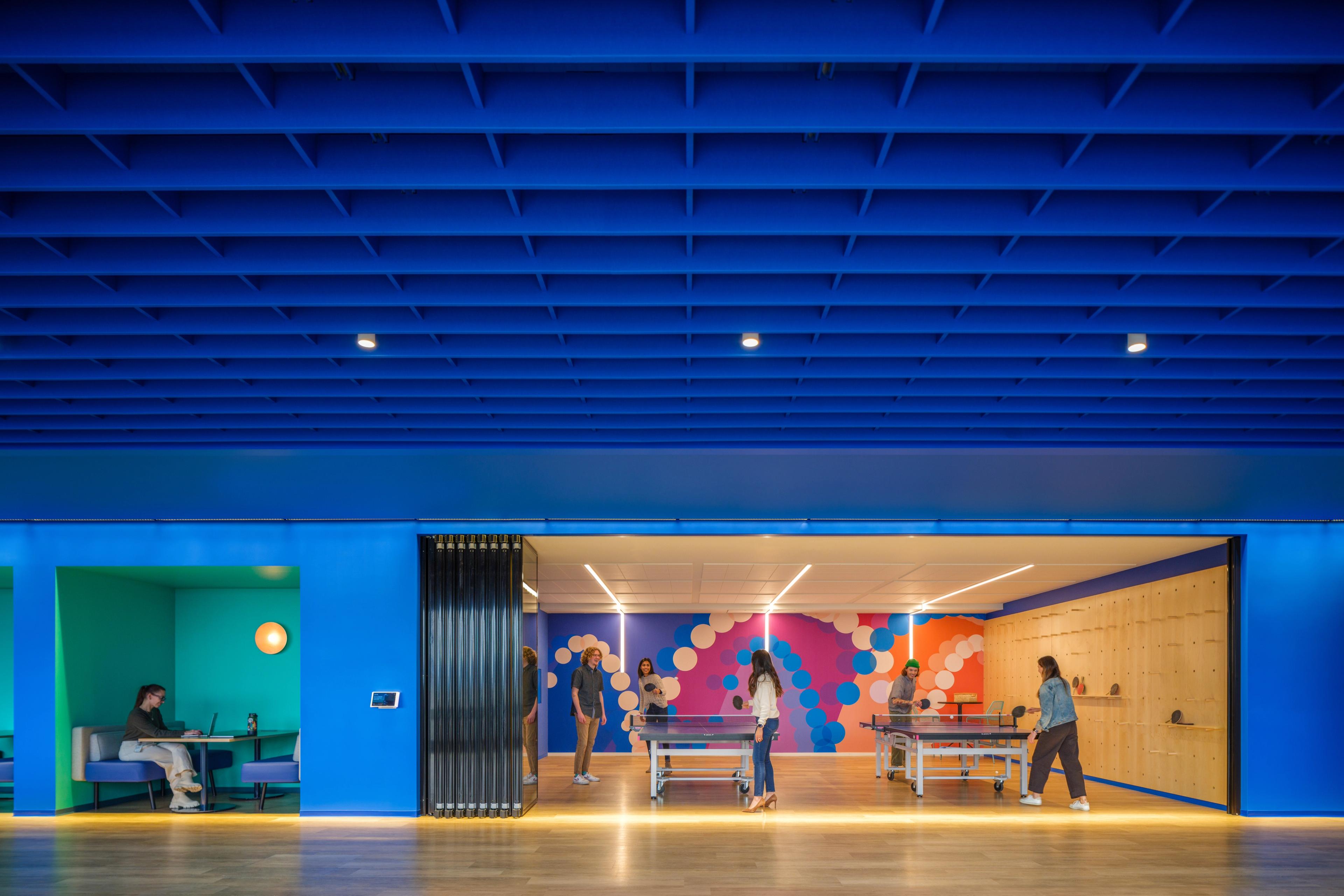 Turf custom acoustic grid ceiling installation at Adobe Founders Tower office in San Jose California.