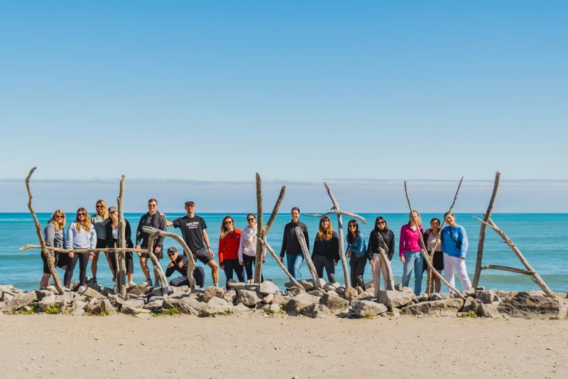 Hokitika beach with Wild Kiwi people