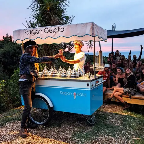 Man serving gelato from a cart