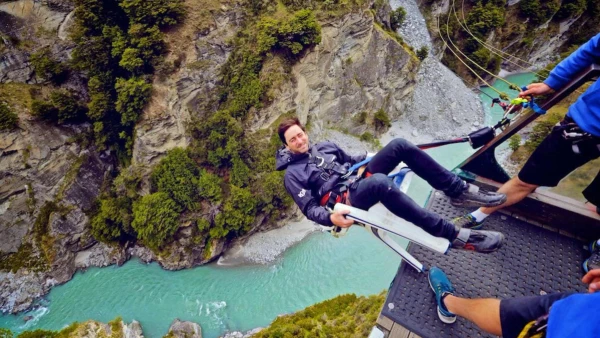 Man on the canyon swing in Queenstown