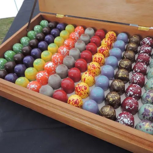 Tray of handmade colourful chocolates