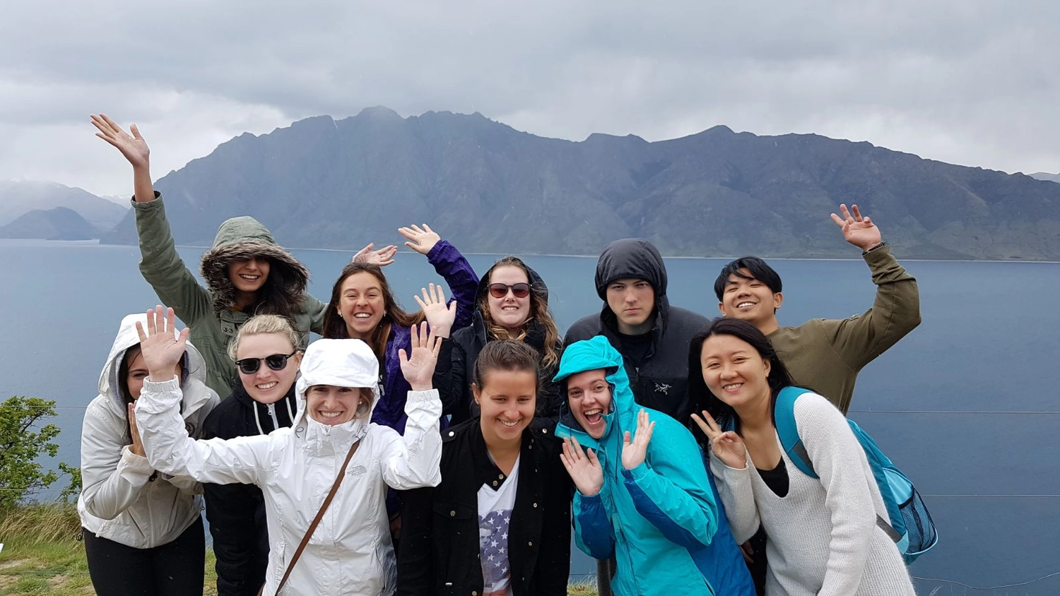Group picture infront of a lake