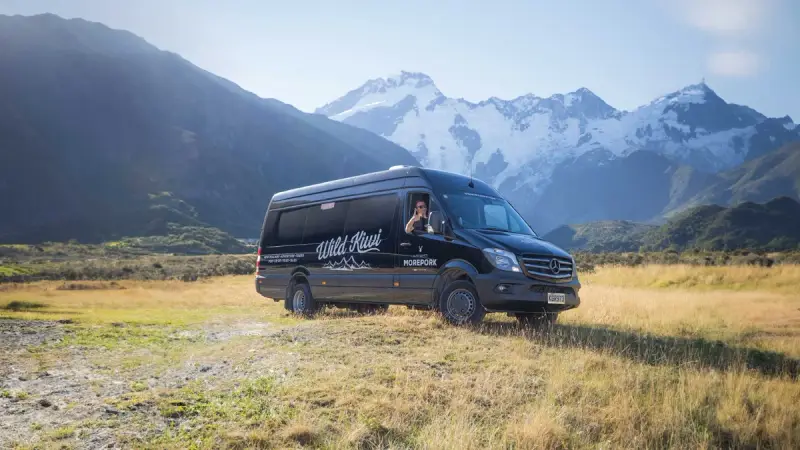 Wild Kiwi vehicle in front of the Remarkables mountains