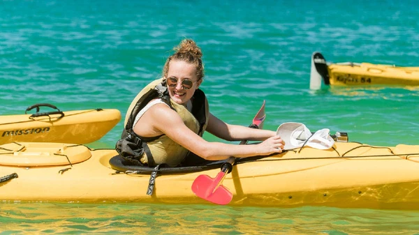 Woman sitting in a kayak