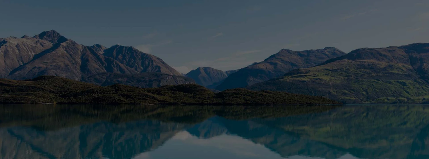 Lake Whakatipu with mountain range in the background