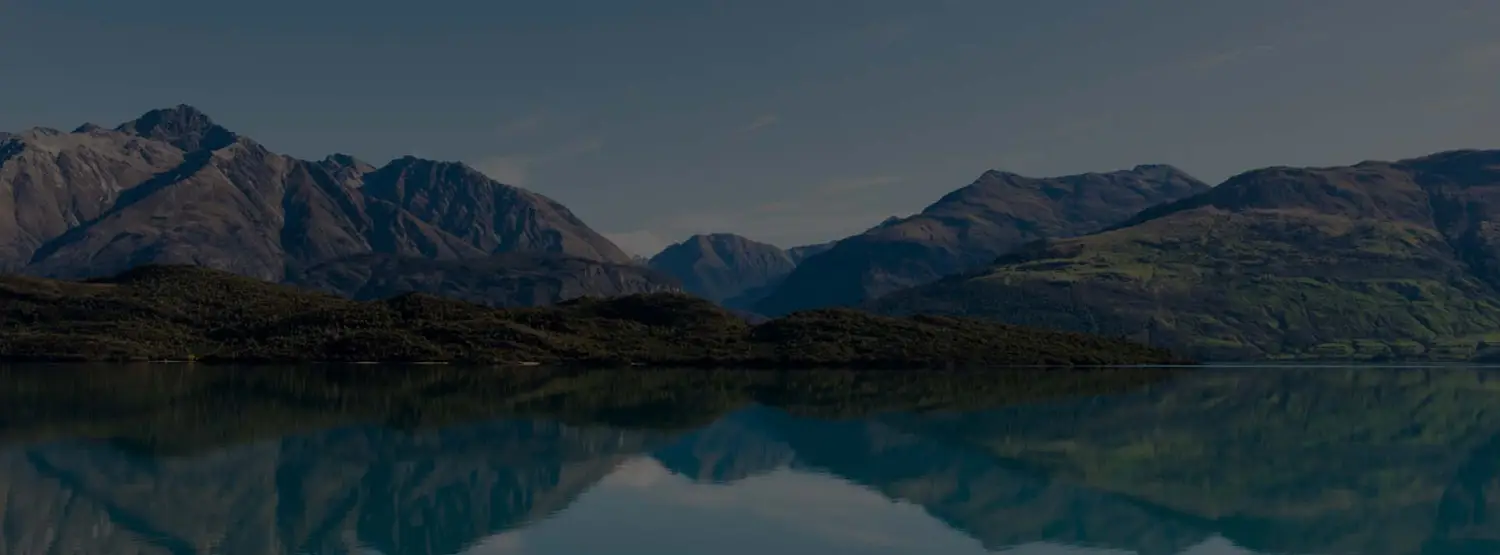 Lake Whakatipu with mountain range in the background