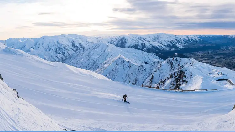 Solo travellers on a snow mountain, Cadrona, New Zealand