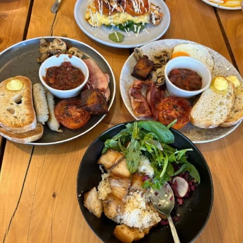 Plates of food at The Greedy Cow Cafe