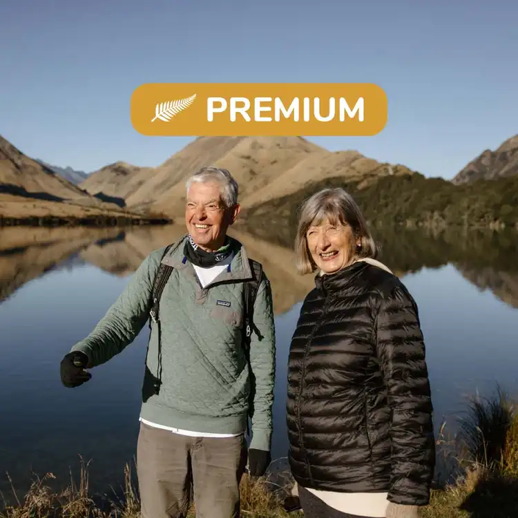 Couple walking next to Moke Lake in Queenstown