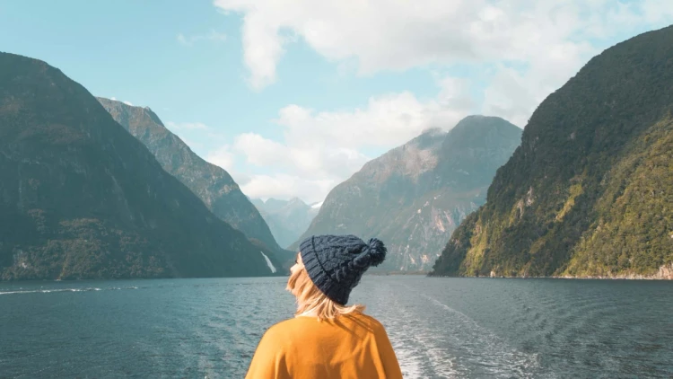 Woman on a cruise in Milford Sound