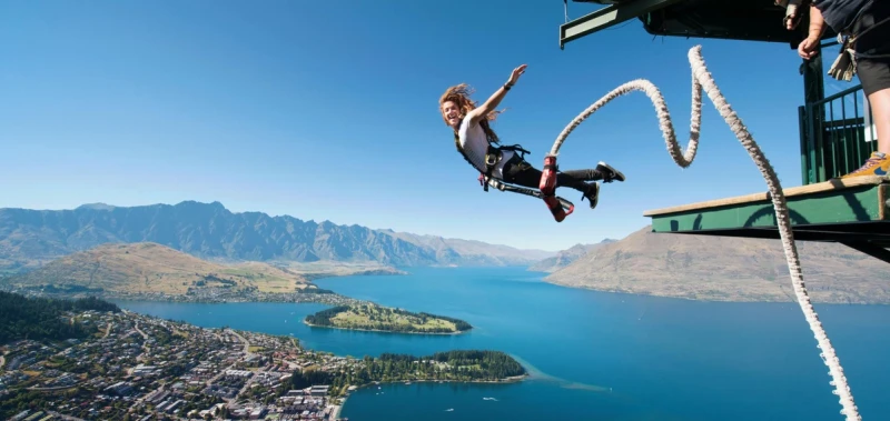 A guy bungee jumping in Queenstown