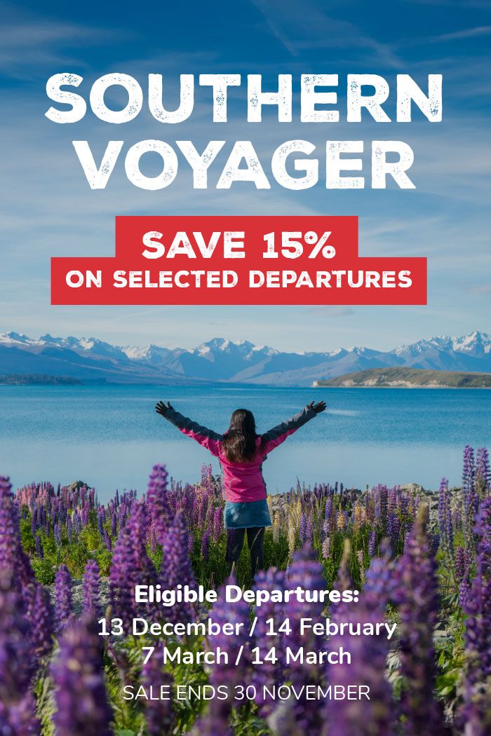 Woman looking at the view over Lake Tekapo