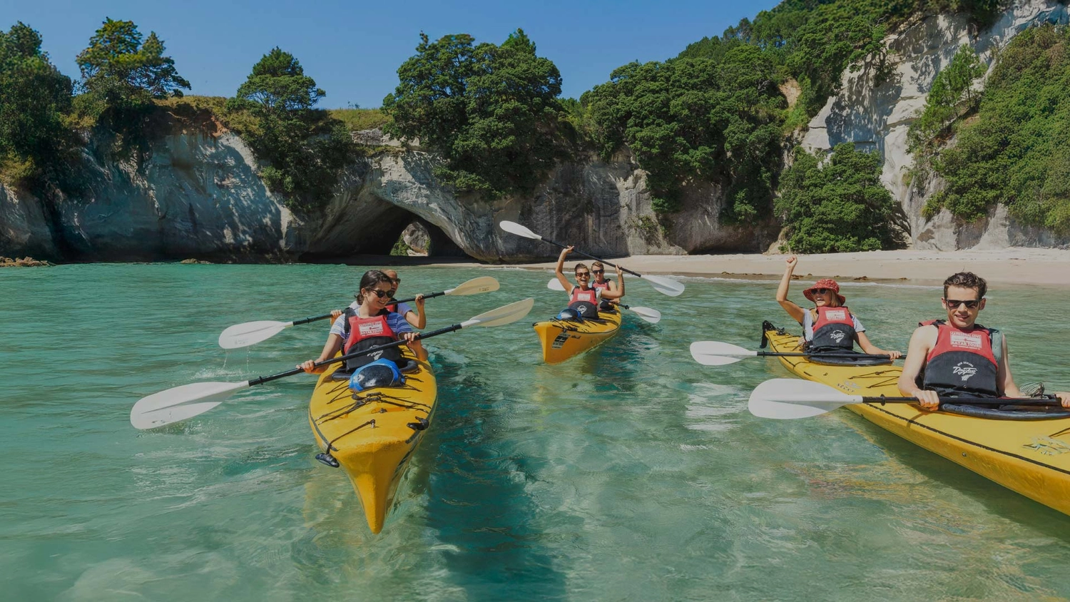 Group of people kayaking at Cathedral Cove
