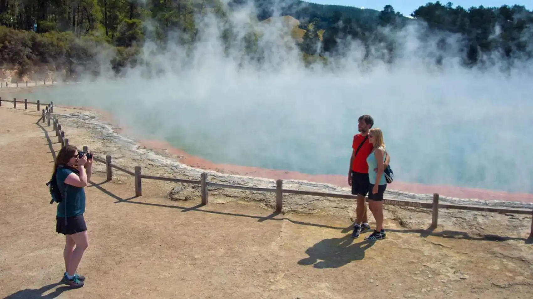 Couple pose for a photo at Wai-O-Tapu