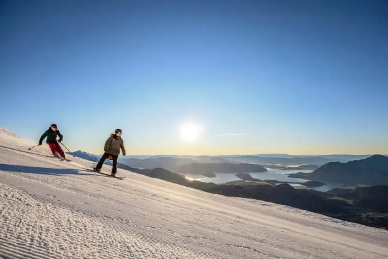 Two people skiing in New Zealand