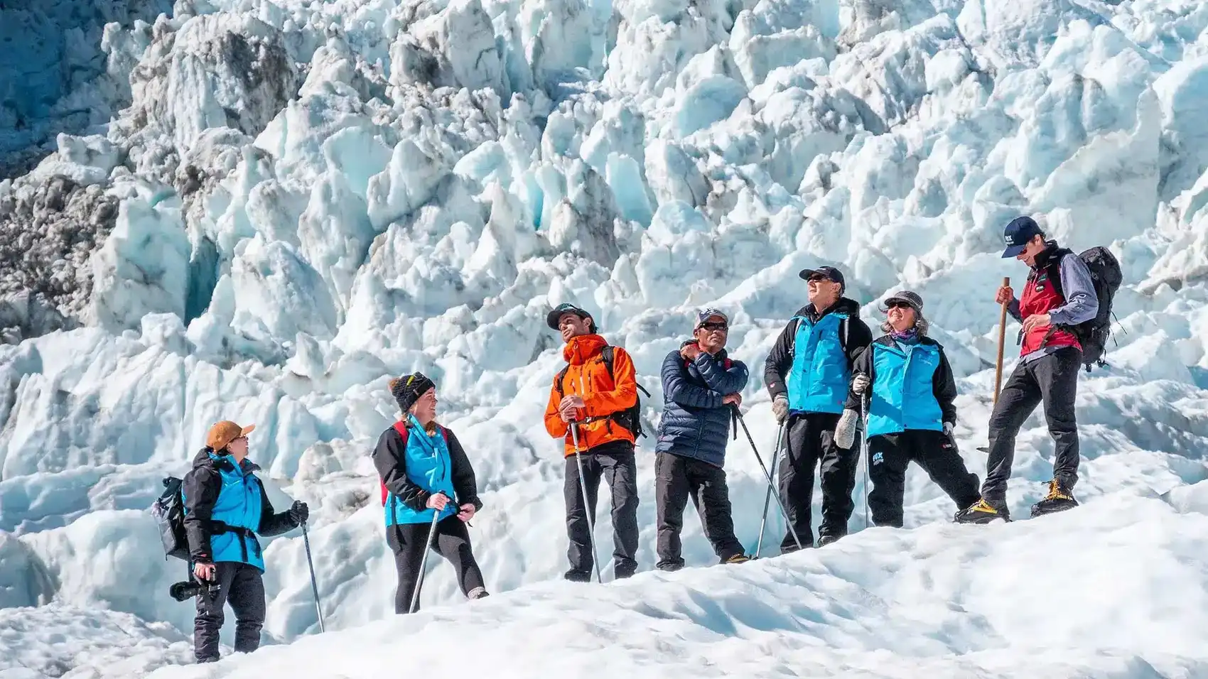 Group of people hiking on Fox Glacier in New Zealand