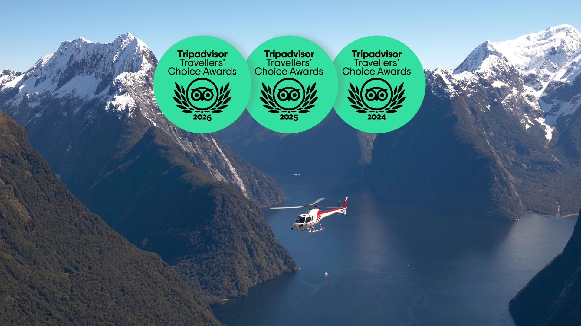 Helicopter flying over Milford Sound