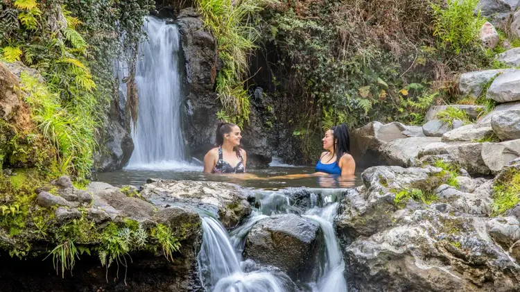 Two people in a hot spring