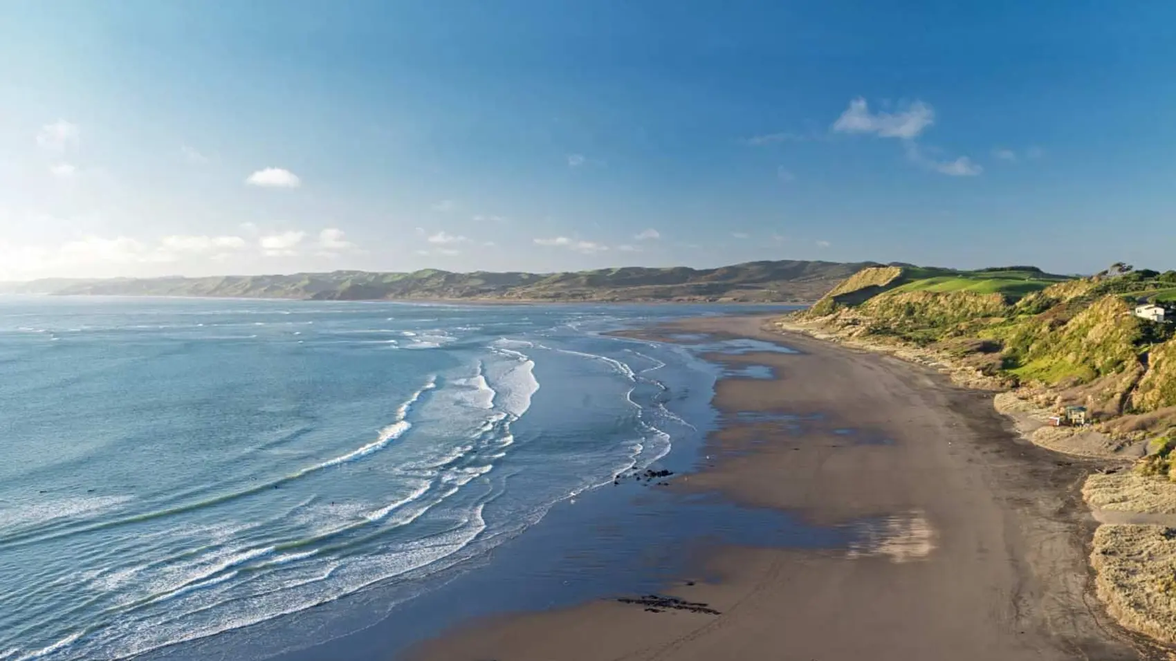 The stunning black sand beach at Raglan