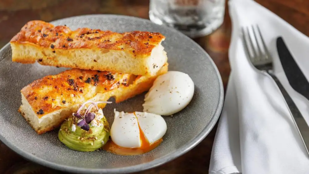 Poached eggs with toast and avocado