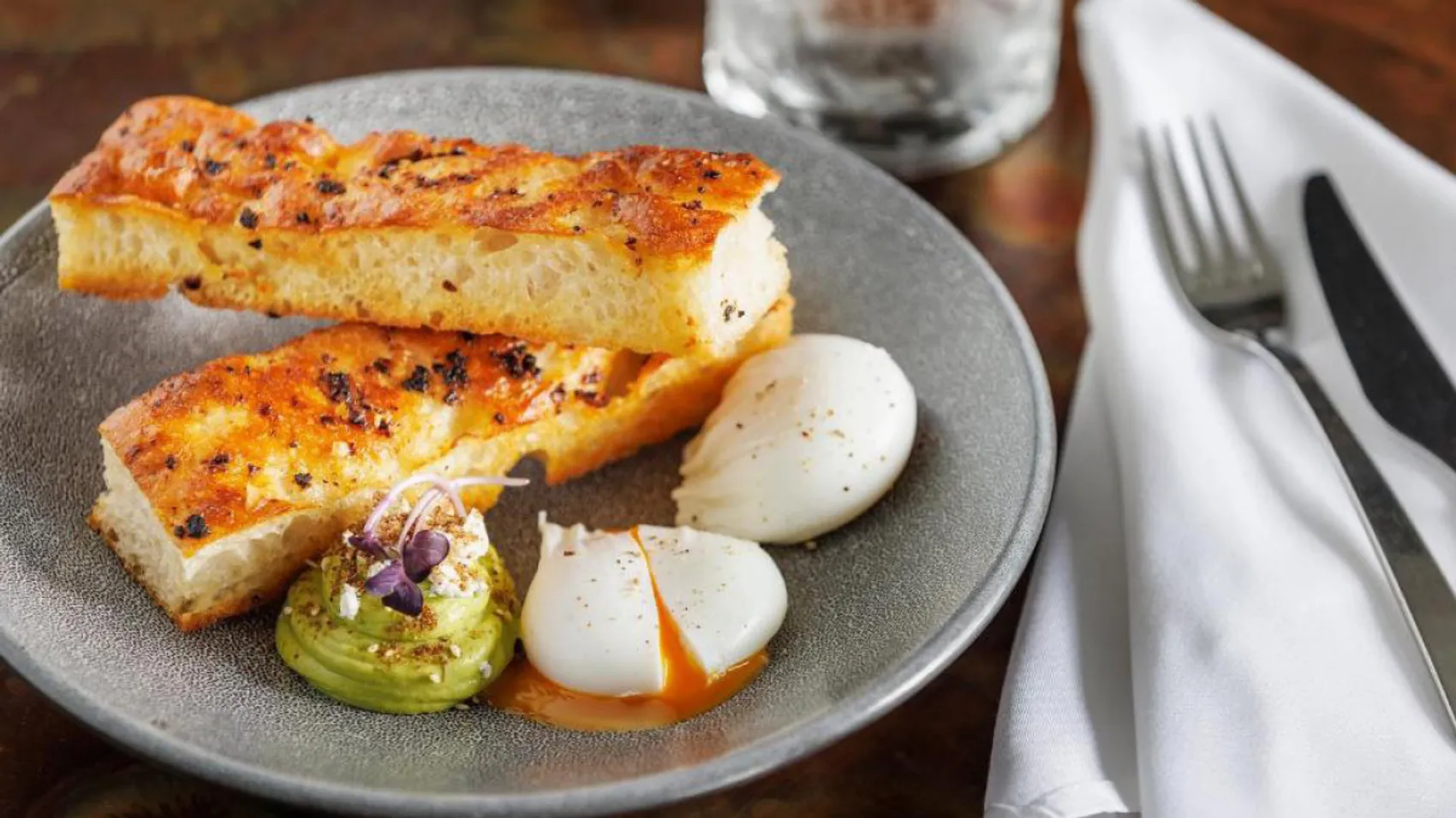 Poached eggs with toast and avocado