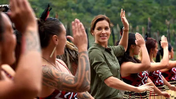 Woman experiencing a traditional Māori dance in New Zealand