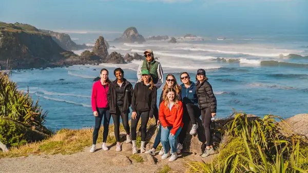 Group of guests pose for a photo