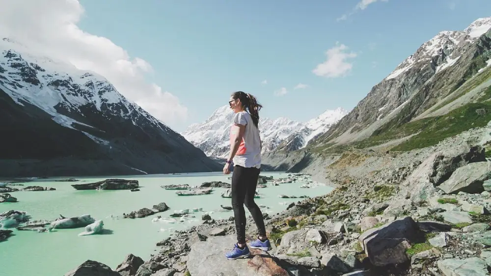 Young woman walking in Mount Cook National Park