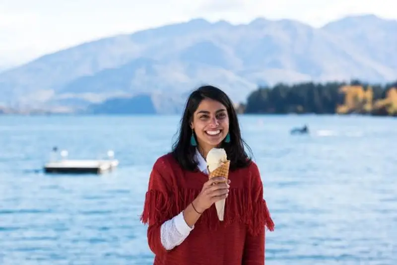 Wild Kiwi guest enjoying hokey pokey ice-cream in Queenstown