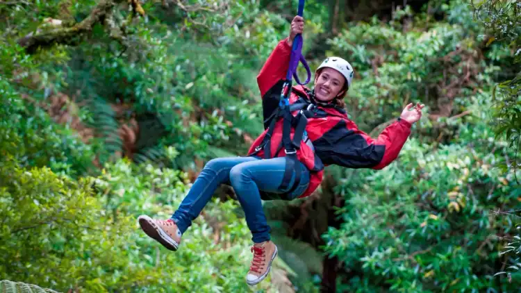 Woman on a zipline in Rotorua