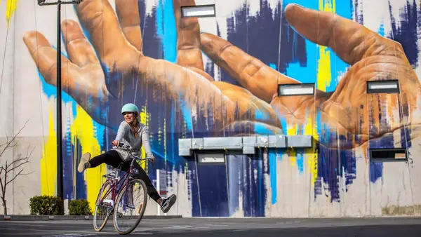 Woman on a bike in Christchurch