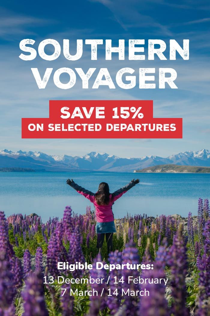 Woman looking at the view over Lake Tekapo