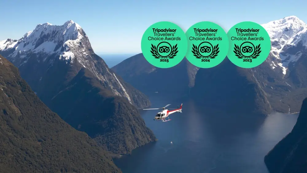Helicopter flying over Milford Sound