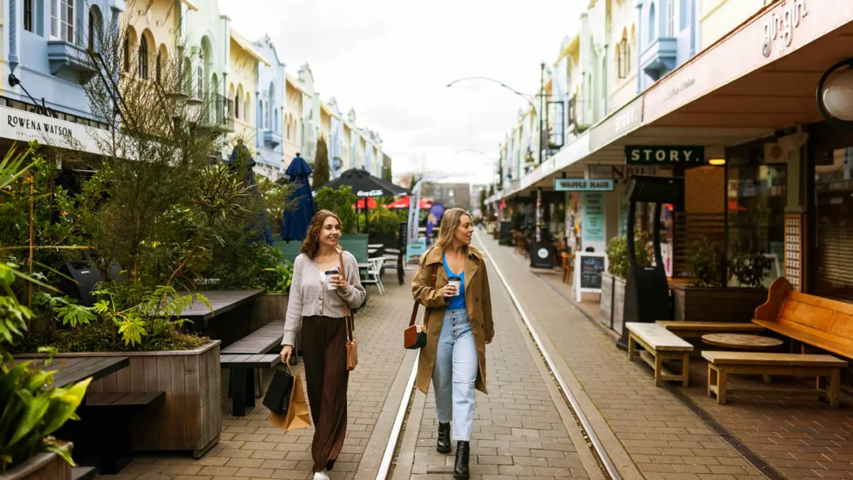 Two women walking through Christchurch