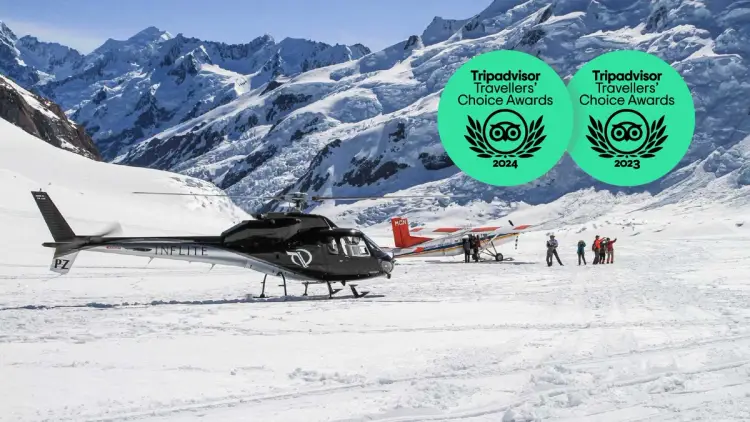 Helicopter and plane on an alpine landing