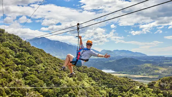 Woman going ziplining in Kaikoura